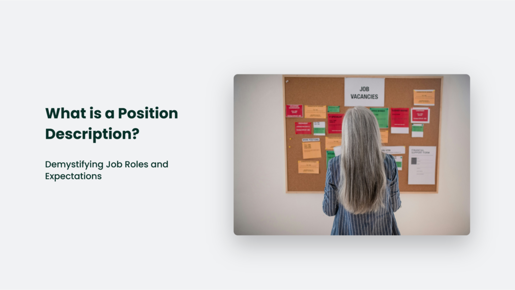 A Person With Long Hair In A Striped Shirt Stands In Front Of A Bulletin Board Labeled &Quot;Job Vacancies,&Quot; Examining Various Pinned Notices. Beside Them, Text Queries, &Quot;What Is A Position Description?