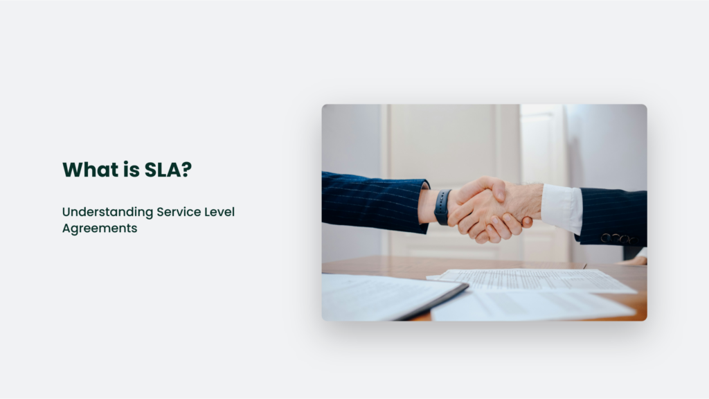 Two People Shake Hands Over A Table With Documents, Illustrating An Agreement. The Text Reads, &Quot;What Is Sla? Understanding Service Level Agreements.